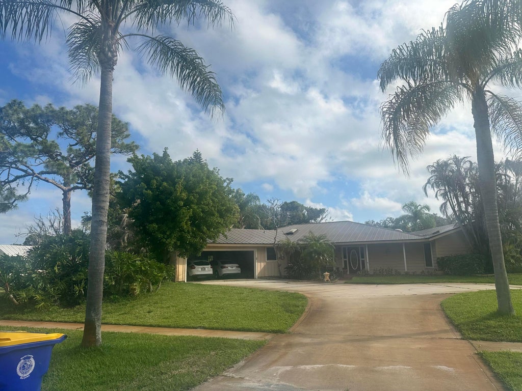 Photo of 931 NE Town Terrace, Jensen Beach, FL 34957 (MLS # B26028855)