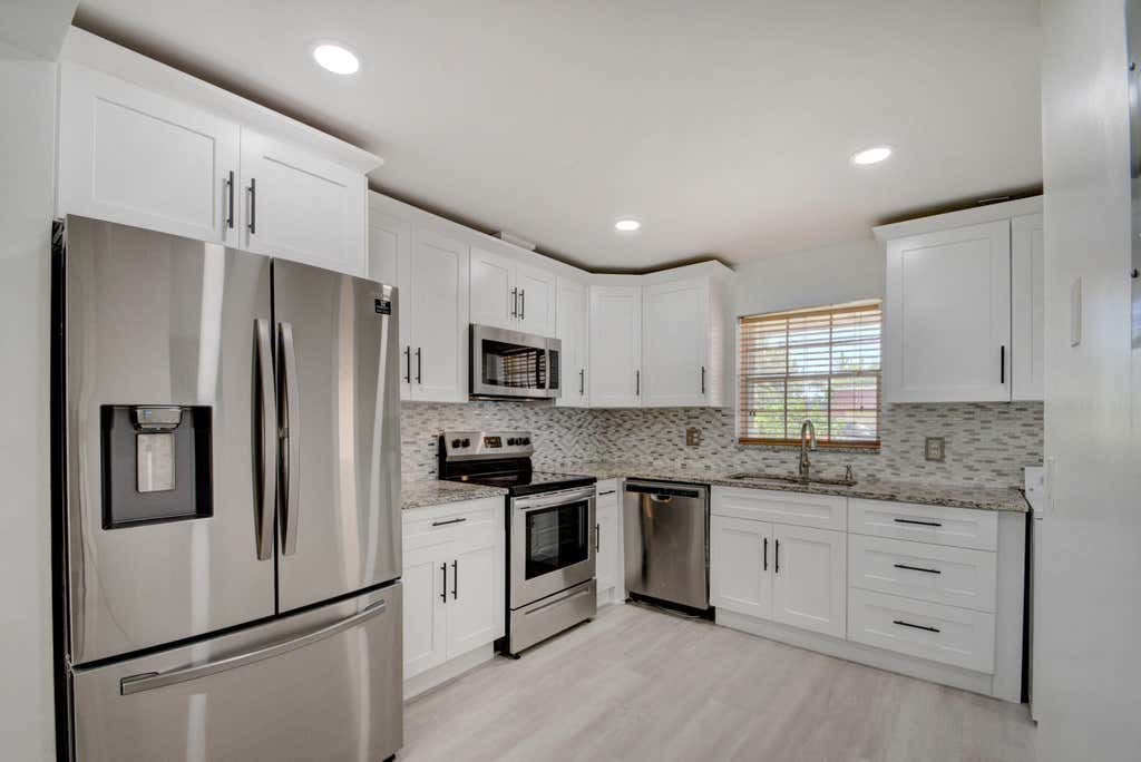 Photo of 855 Salem Lane Ln #A, Lake Worth Beach, FL 33467 (MLS # R10808473)