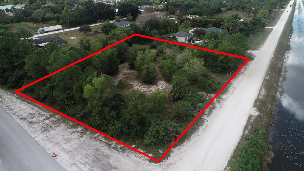 Photo of 5010 Seminole Pratt Whitney Rd, Loxahatchee, FL 33470 (MLS # R11153819)