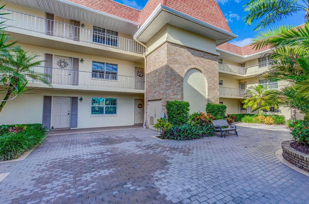 Photo of 5560 Tamberlane Circle #223, Palm Beach Gardens, FL 33418 (MLS # R10933492)