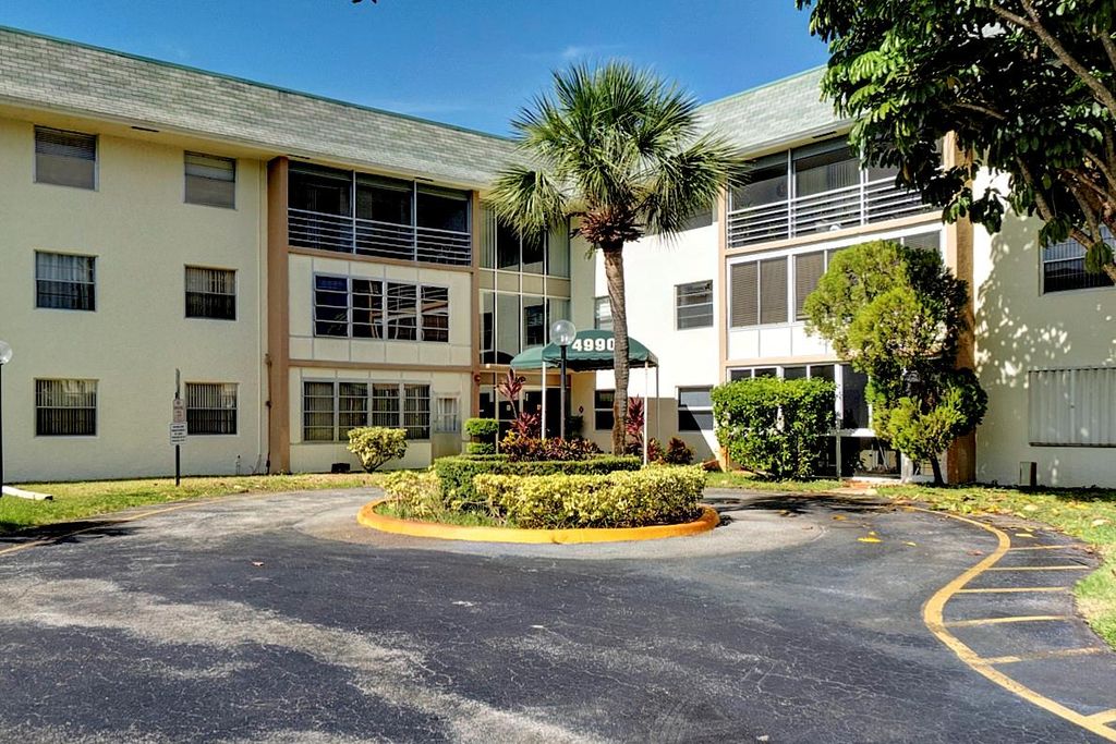 Photo of 4990 E Sabal Palm Blvd #306, Tamarac, FL 33319 (MLS # F10517176)