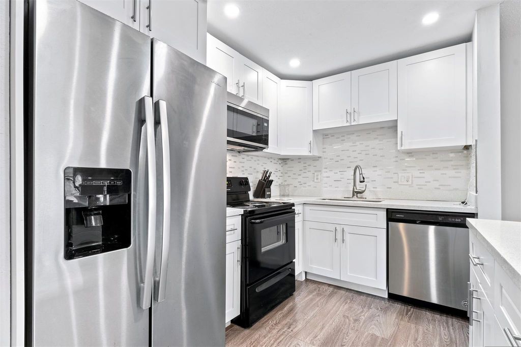 Photo of 4990 E Sabal Palm Blvd #306, Tamarac, FL 33319 (MLS # F10517176)