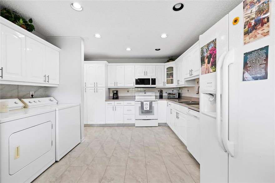 Experience the best of active adult living at The Pines of Delray North! This beautifully maintained 2/2 residence offers 1,335 sq ft in one of Delray Beach’s most sought-after 55+ communities. Enjoy a bright and inviting layout featuring a large kitchen with a breakfast area, walk-in closets & storage space. In-unit washer & dryer, 10-year-old AC & newer tankless water heater. 24-hour gated security and array of amenities, including 2 clubhouses, swimming pools, pickleball & tennis courts, bocce, card & billiard rooms, fitness equipment & calendar of events and shows. Perfectly situated just minutes from the beach and downtown Delray Beach, this home offers easy access to shopping, dining, houses of worship, and I-95—making it the perfect blend of comfort, convenience, and community.