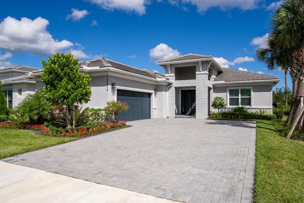 Photo of 10016 Timber Creek Way, Palm Beach Gardens, FL 33412 (MLS # R11127336)