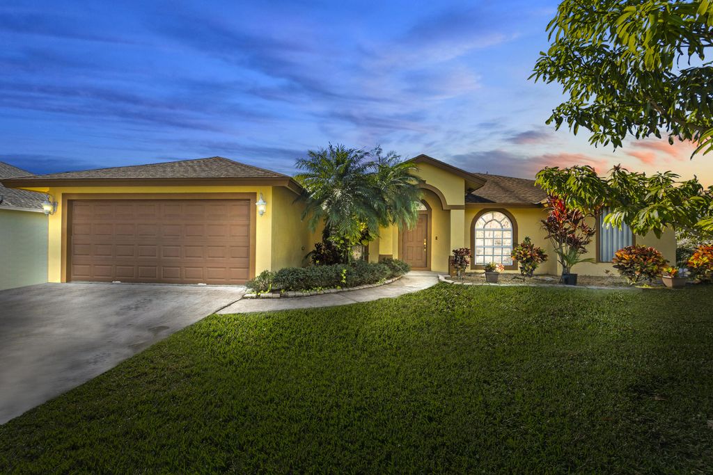 Photo of 1234 SW Malaga Avenue, Port Saint Lucie, FL 34953 (MLS # R10777451)