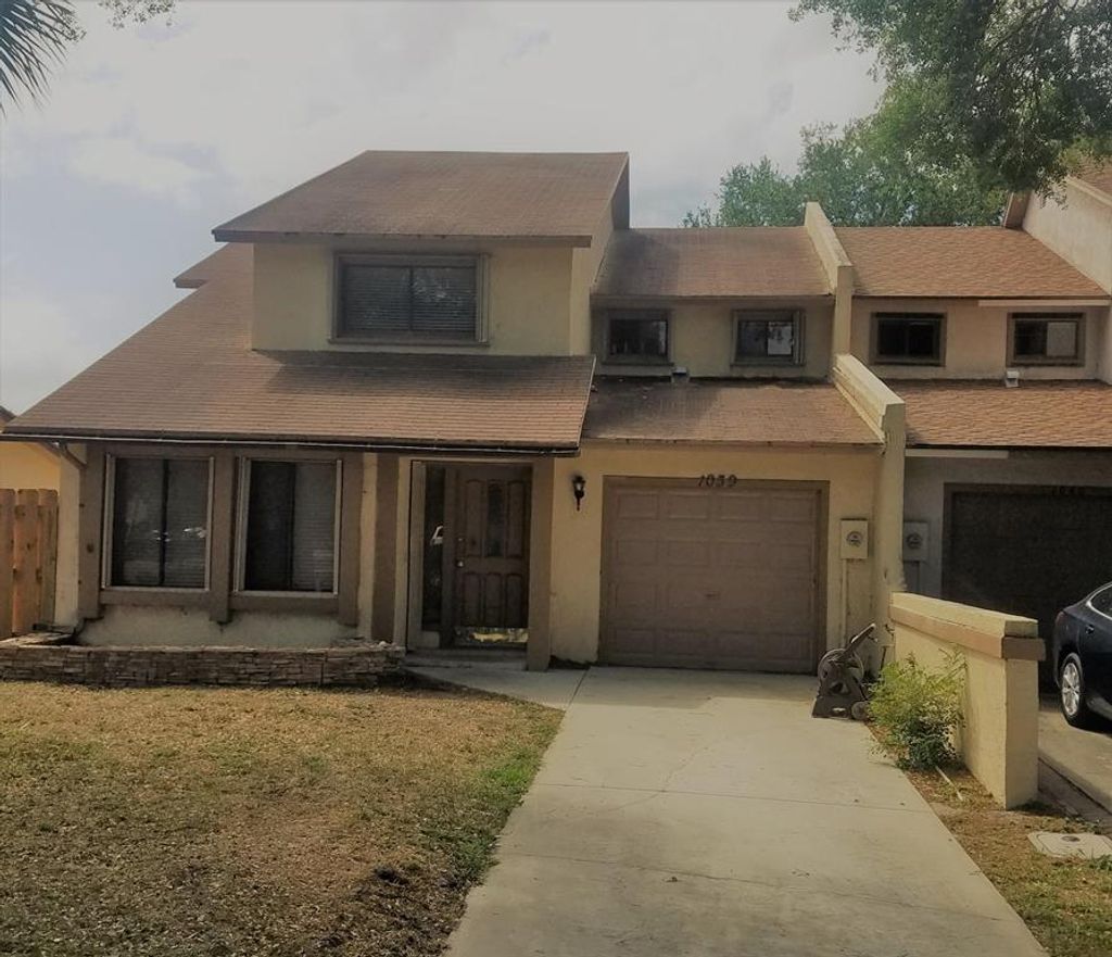 Photo of 1039 Raintree Drive, Palm Beach Gardens, FL 33410 (MLS # R10701857)