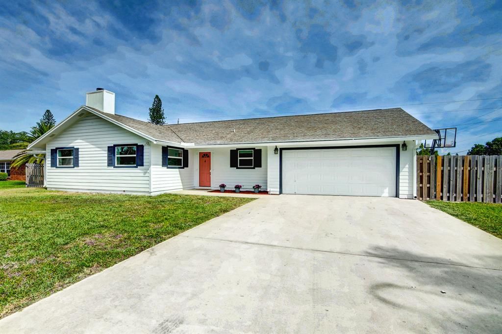 Photo of 3151 Emerald Lane Ln, Lake Worth Beach, FL 33462 (MLS # R10703610)