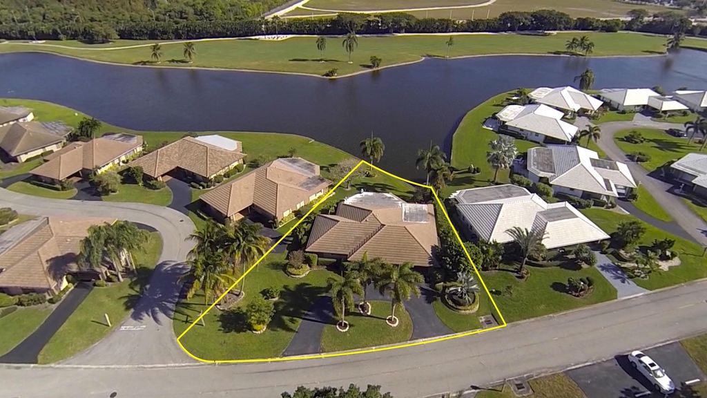 Photo of 334 Villa Drive S, Atlantis, FL 33462 (MLS # R10928861)