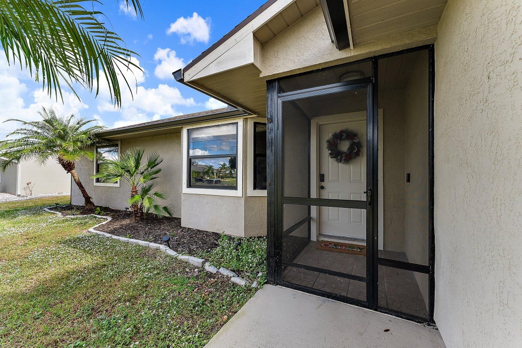 Photo of 3773 SW Jack Street, Port Saint Lucie, FL 34953 (MLS # R11048655)