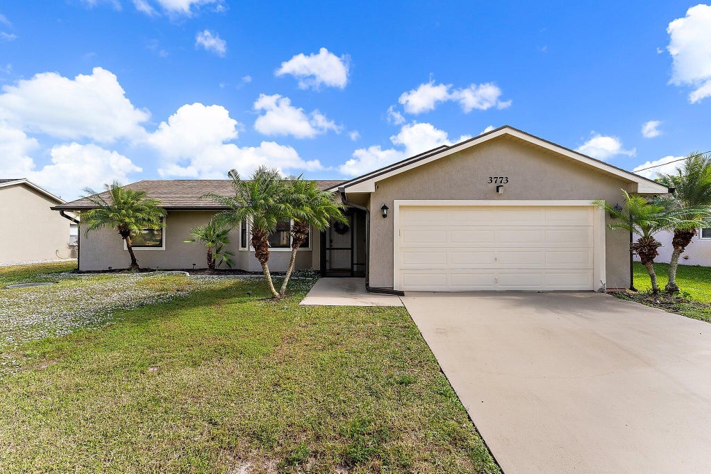 Photo of 3773 SW Jack Street, Port Saint Lucie, FL 34953 (MLS # R11048655)