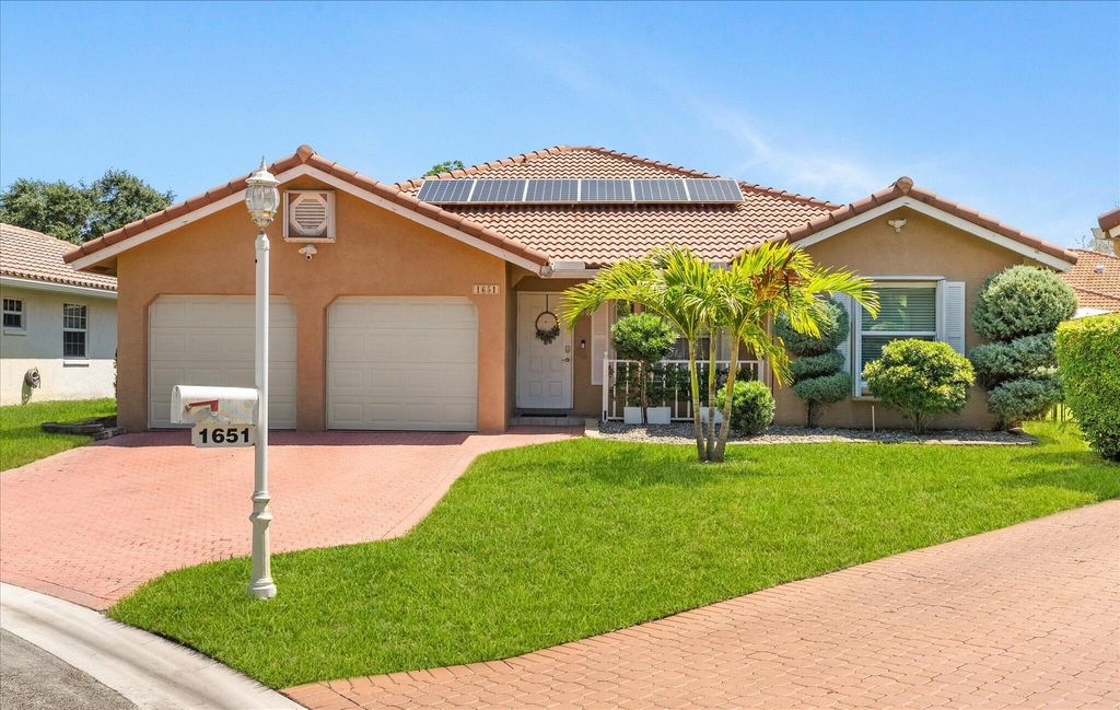 Photo of 1651 NW 106th Way, Coral Springs, FL 33071 (MLS # B26024465)