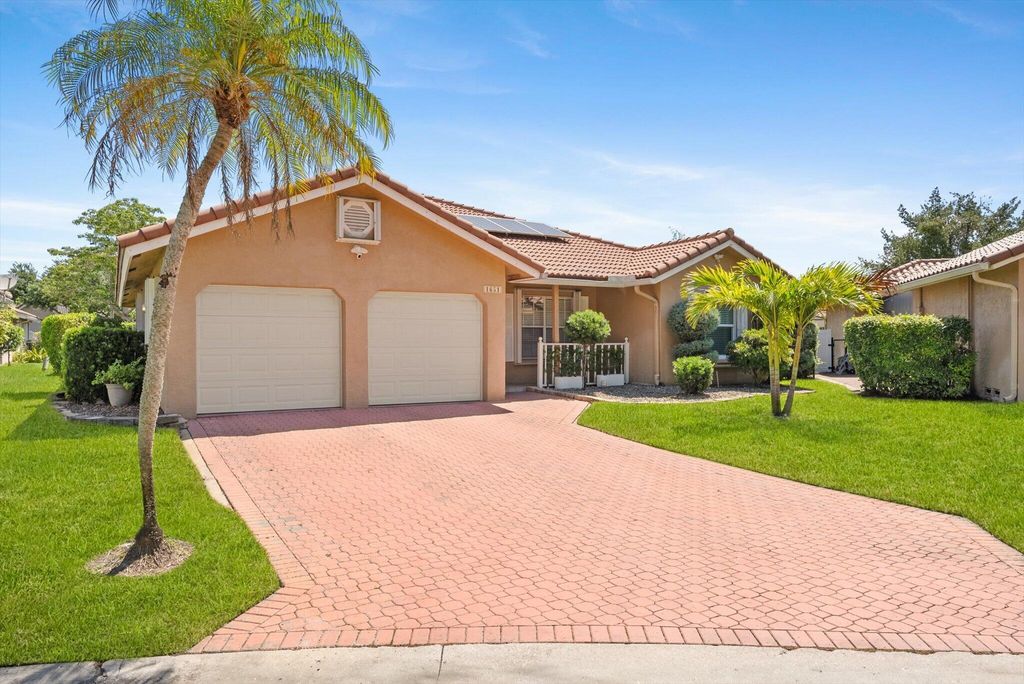 Photo of 1651 NW 106th Way, Coral Springs, FL 33071 (MLS # B26024465)