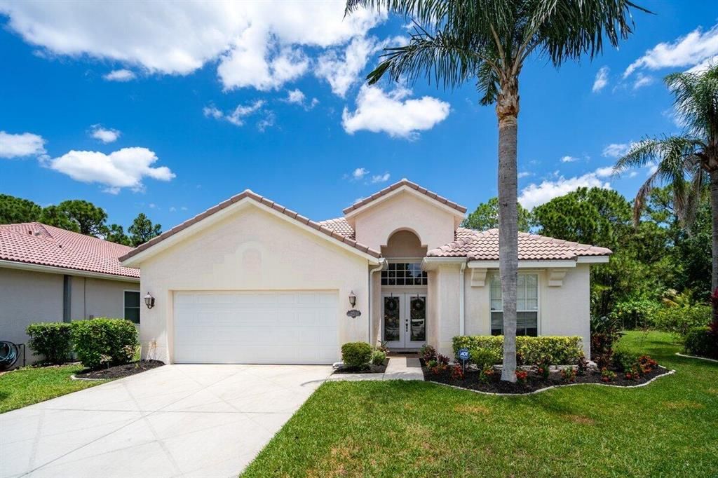 Photo of 565 SW Saint Martins Cove, Port Saint Lucie, FL 34986 (MLS # R10799041)