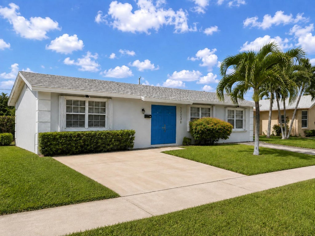 Photo of 1223 W 27th Street, Riviera Beach, FL 33404 (MLS # B26062626)