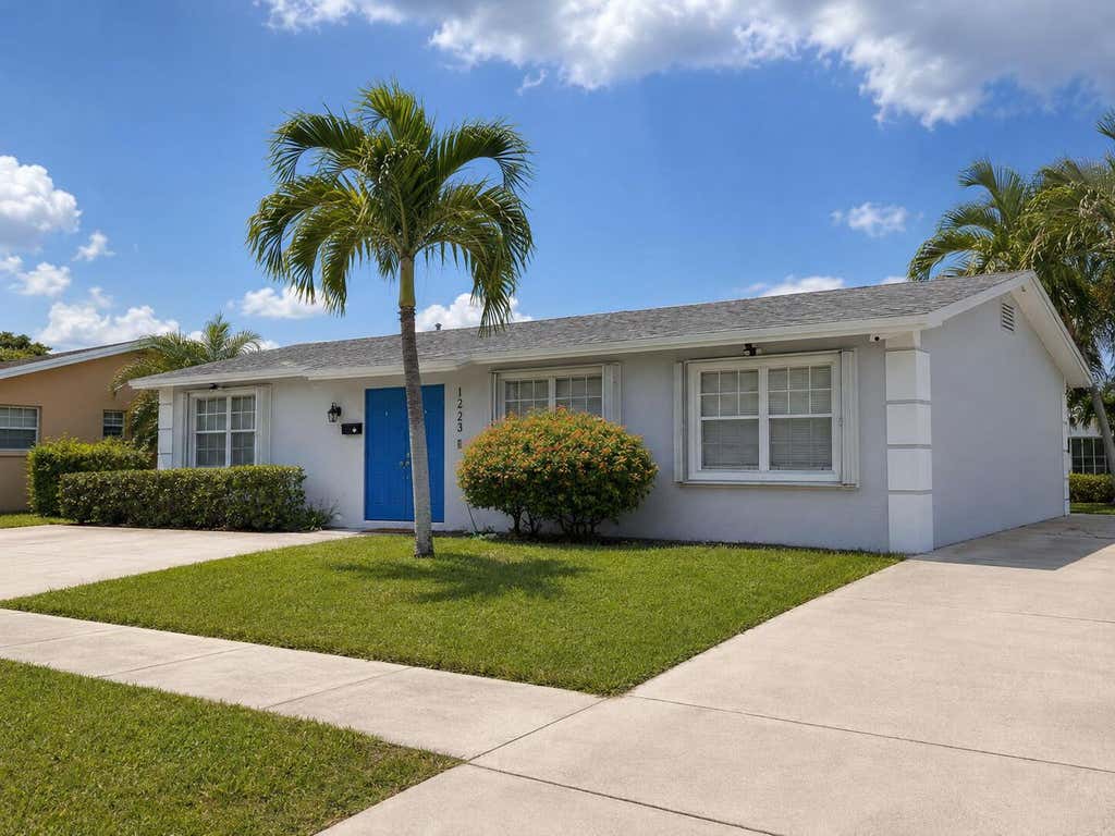 Photo of 1223 W 27th Street, Riviera Beach, FL 33404 (MLS # B26062626)
