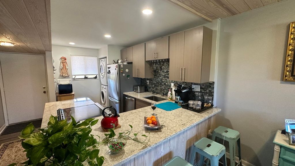 Photo of 5355 SE Miles Grant Road #209, Stuart, FL 34997 (MLS # B26028656)
