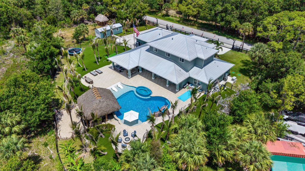 Photo of 6154 SW Woodham Street, Palm City, FL 34990 (MLS # B26030005)