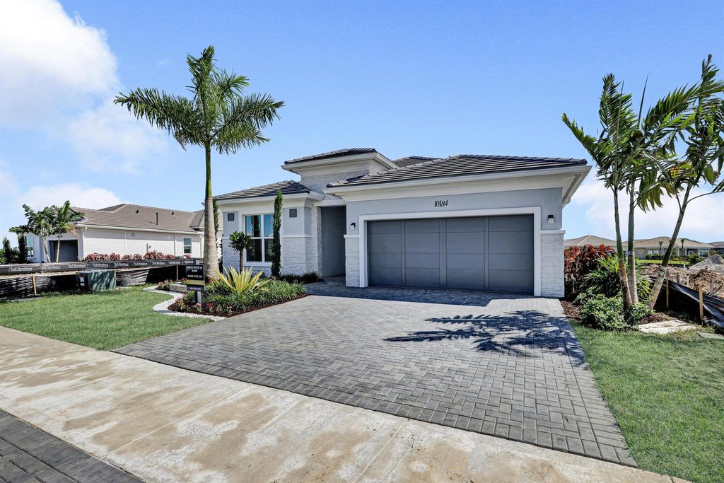 Photo of 10184 Riverstone Way, Palm Beach Gardens, FL 33412 (MLS # R11129520)