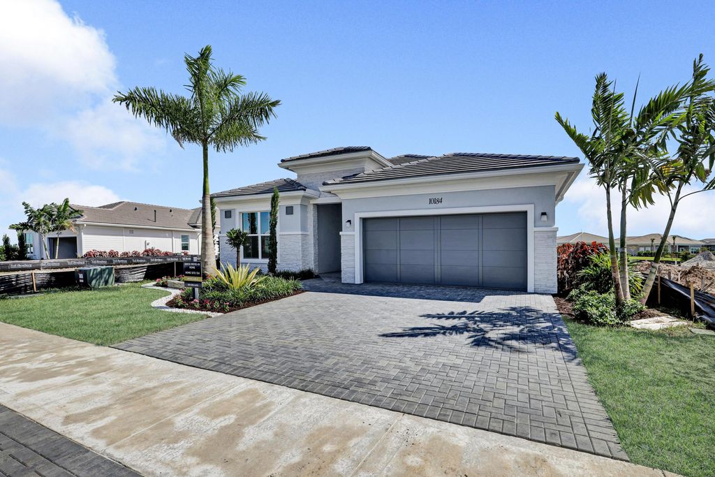 Photo of 10184 Riverstone Way, Palm Beach Gardens, FL 33412 (MLS # R11129520)