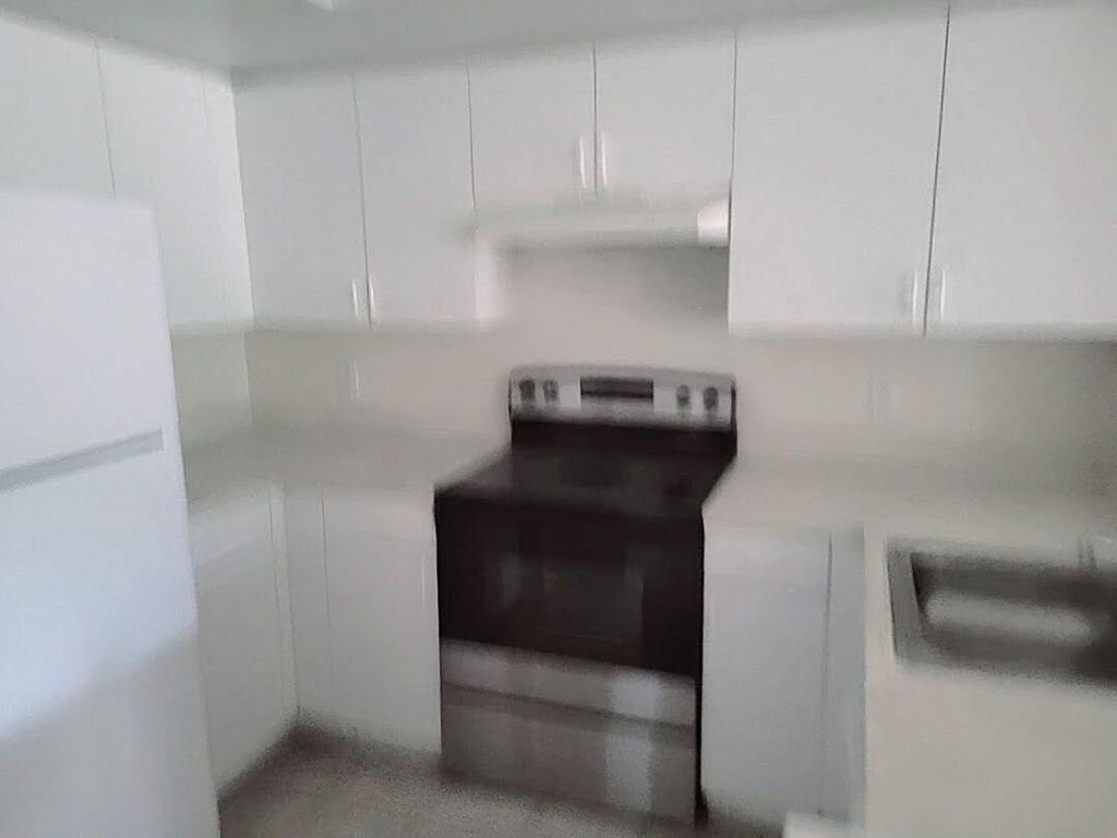 Photo of 4195 N Haverhill Road #324, West Palm Beach, FL 33417 (MLS # B26013372)