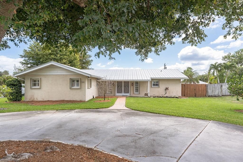 Photo of 5084 SE Horseshoe Point Road, Stuart, FL 34997 (MLS # R10700774)