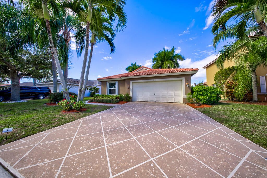 Photo of 5540 Muirfield Village Circle, Lake Worth, FL 33463 (MLS # R11161649)