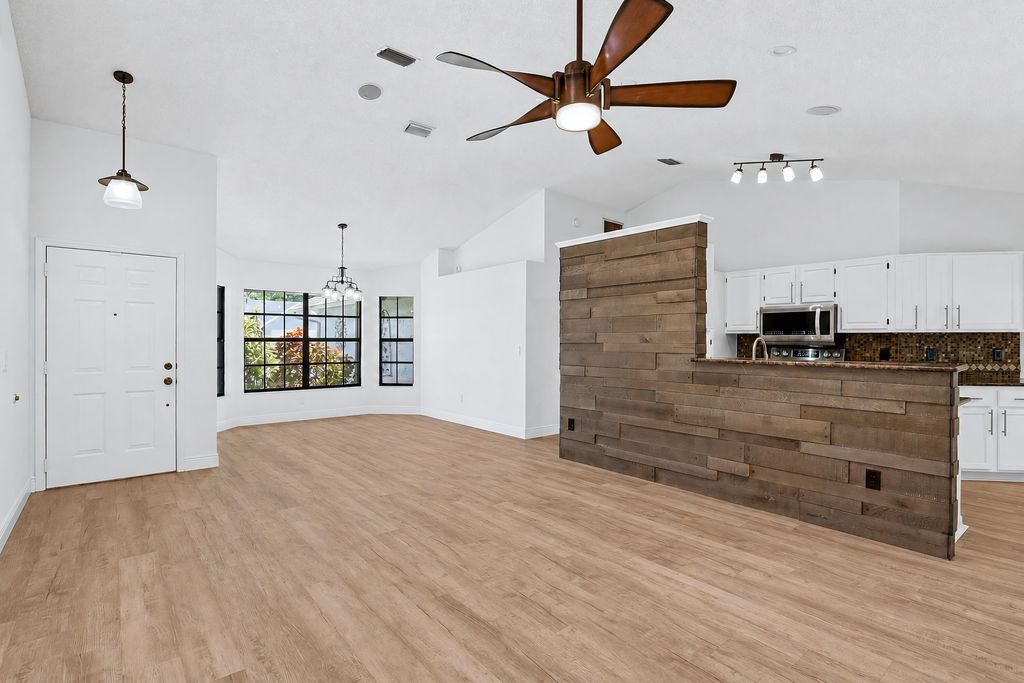 Photo of 117 Sherwood Drive, Royal Palm Beach, FL 33411 (MLS # B26042397)