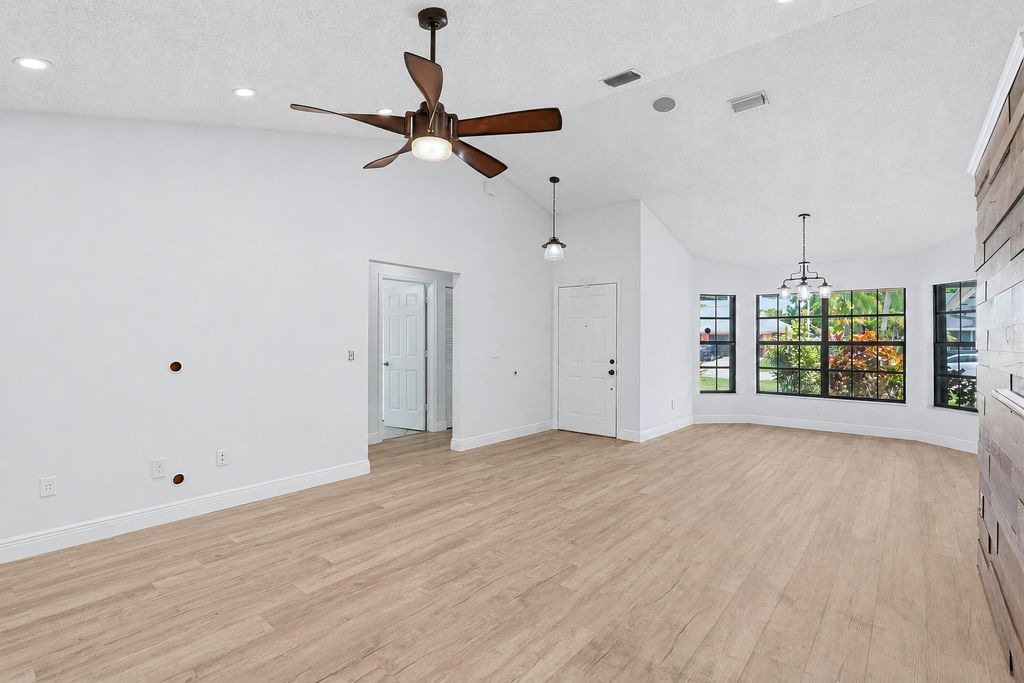 Photo of 117 Sherwood Drive, Royal Palm Beach, FL 33411 (MLS # B26042397)