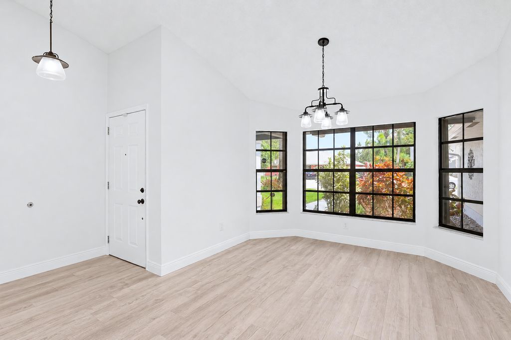 Photo of 117 Sherwood Drive, Royal Palm Beach, FL 33411 (MLS # B26042397)