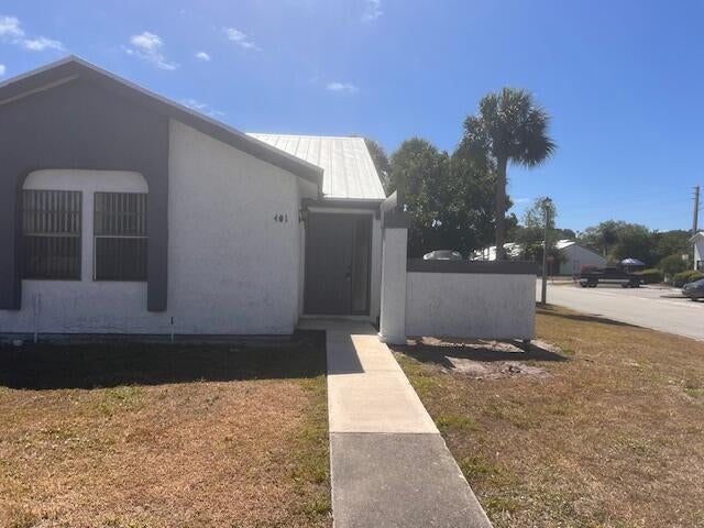 Photo of 401 SW Godels Street, Port Saint Lucie, FL 34953 (MLS # R10975823)