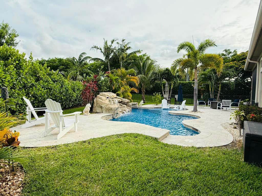 Photo of 9505 Kalmar Cir Circle W, Parkland, FL 33076 (MLS # B26039698)