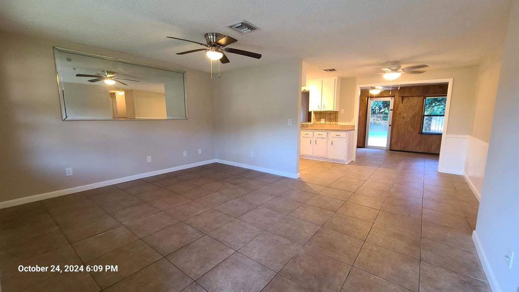 Photo of 401 NW Fairfax Ave, Port Saint Lucie, FL 34983 (MLS # R11033703)