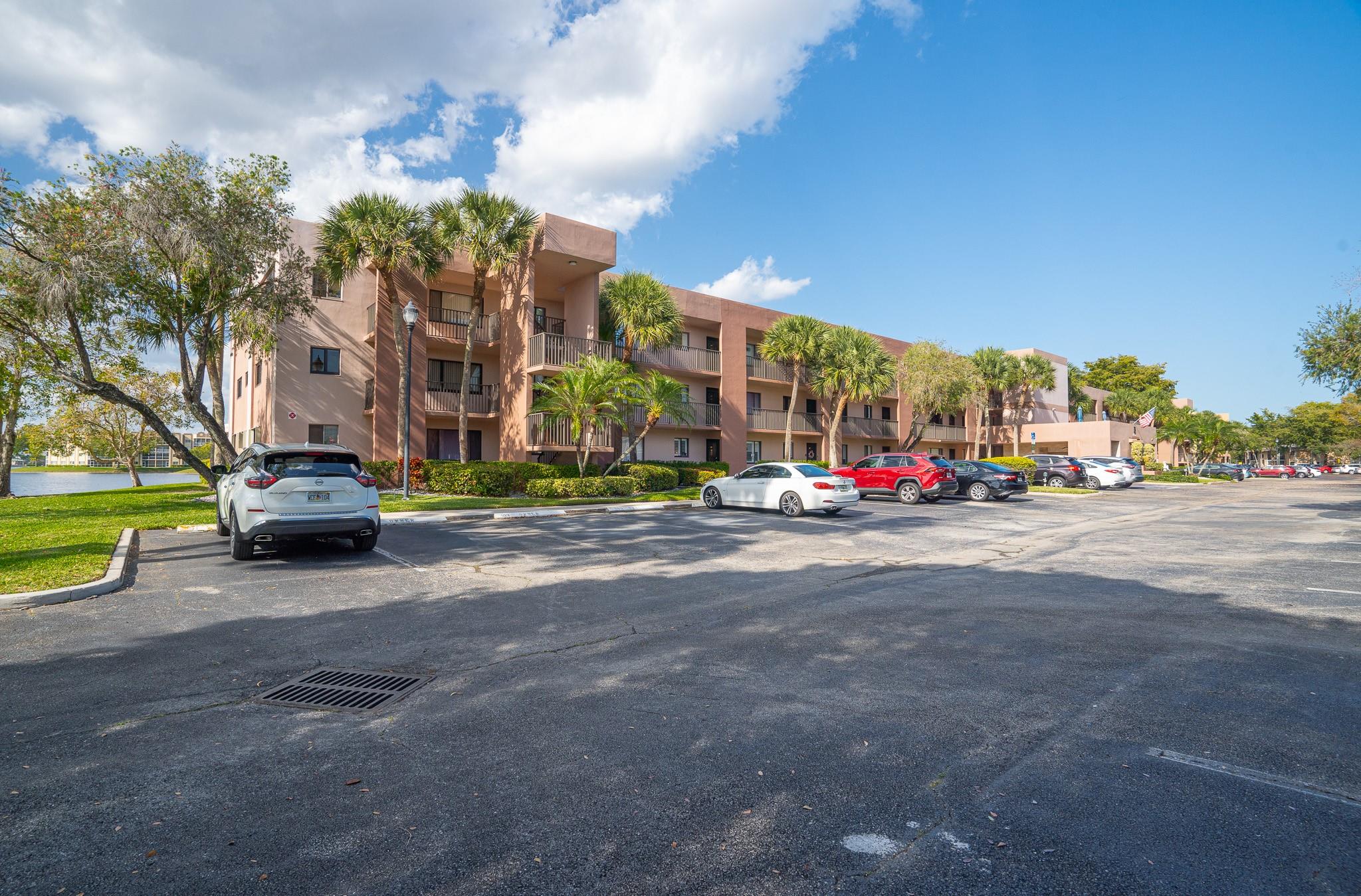 PRICE REDUCTION - Motivated seller presents this spacious 2-bedroom, 2-bathroom condo in Ashmont at Kings Point, Tamarac, featuring a stunning water view. Both the master and guest bathrooms have been remodeled, along with the kitchen, which now boasts wood cabinetry and granite countertops. This well-appointed home offers a mix of tile and laminate flooring throughout. Relax on the rear enclosed patio while taking in the serene water view. There is also a patio area at the building for small gatherings and entertainment. The Kings Point community offers a beautiful main clubhouse, complete with a theater, heated pools, a gym, courtesy buses, and a variety of social activities. Conveniently located near shopping, hospitals, and parks, this opportunity is not to be missed!