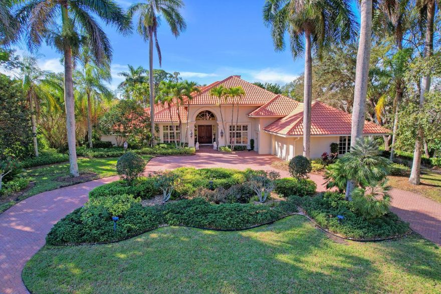 BEAUTIFUL LANDSCAPED LOT ON A QUIET STREET CLOSE TO CLUBHOUSE.