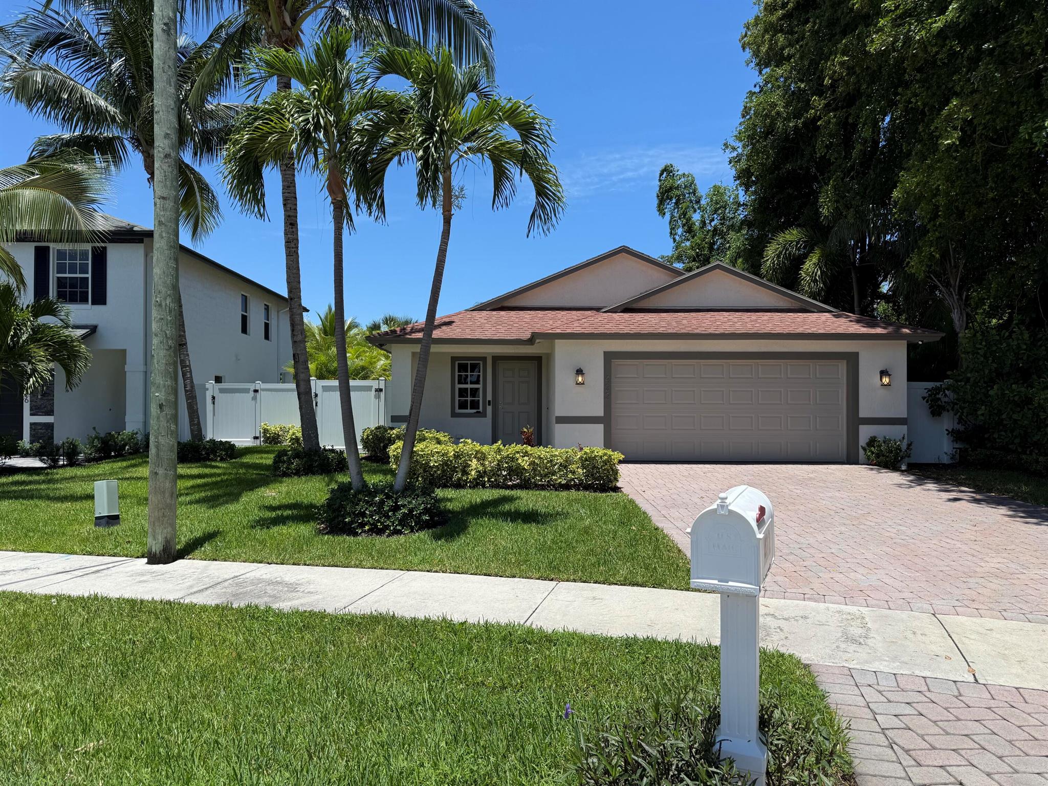 WELCOME TO A HIDDEN GEM, LUCKY LANE, A SEMI PRIVATE CUL-DE-SAC STREET LINED WITH RECENTLY BUILT & BRAND NEW HOMES $1M+ AND ACROSS FROM POINT PARK. THIS HOME WAS TOTALY UPDATED A YEAR AGO. ALL IMPACT GLASS, LUSH FENCED YARD THAT CAN ACCOMADATE A POOL, OVERSIZED EV READY 2 CAR GARAGE & LONG DRIVEWAY. THE LOCATION IS GREAT, ONLY 1 MILE TO THE BEACH, 1.3 MILES TO TRENDY ATLANTIC & 1/2 MILE TO WHOLE FOODS, STARBUCKS, ETC. GOLF CART FRIENDLY STREETS. BUILT SOLID TO WITHSTAND 170 MPH WINDS, THE HOI PREMIUM IS ONLY ABOUT $2,600 W/ 2% WIND DED. PERFECT FOR A PRIMARY, LOCK & LEAVE VACATION HOME OR INVESTMENT. NO WORK TO DO OR REPAIRS NEEDED. 100% TURNKEY. CHECK OUT THE PHOTOS & TOUR IT TODAY. SPECIAL FINANCING AVAILABLE.