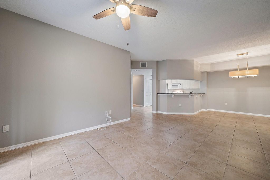 Photo of 3020 Alcazar Place #204, Palm Beach Gardens, FL 33410 (MLS # F10417374)