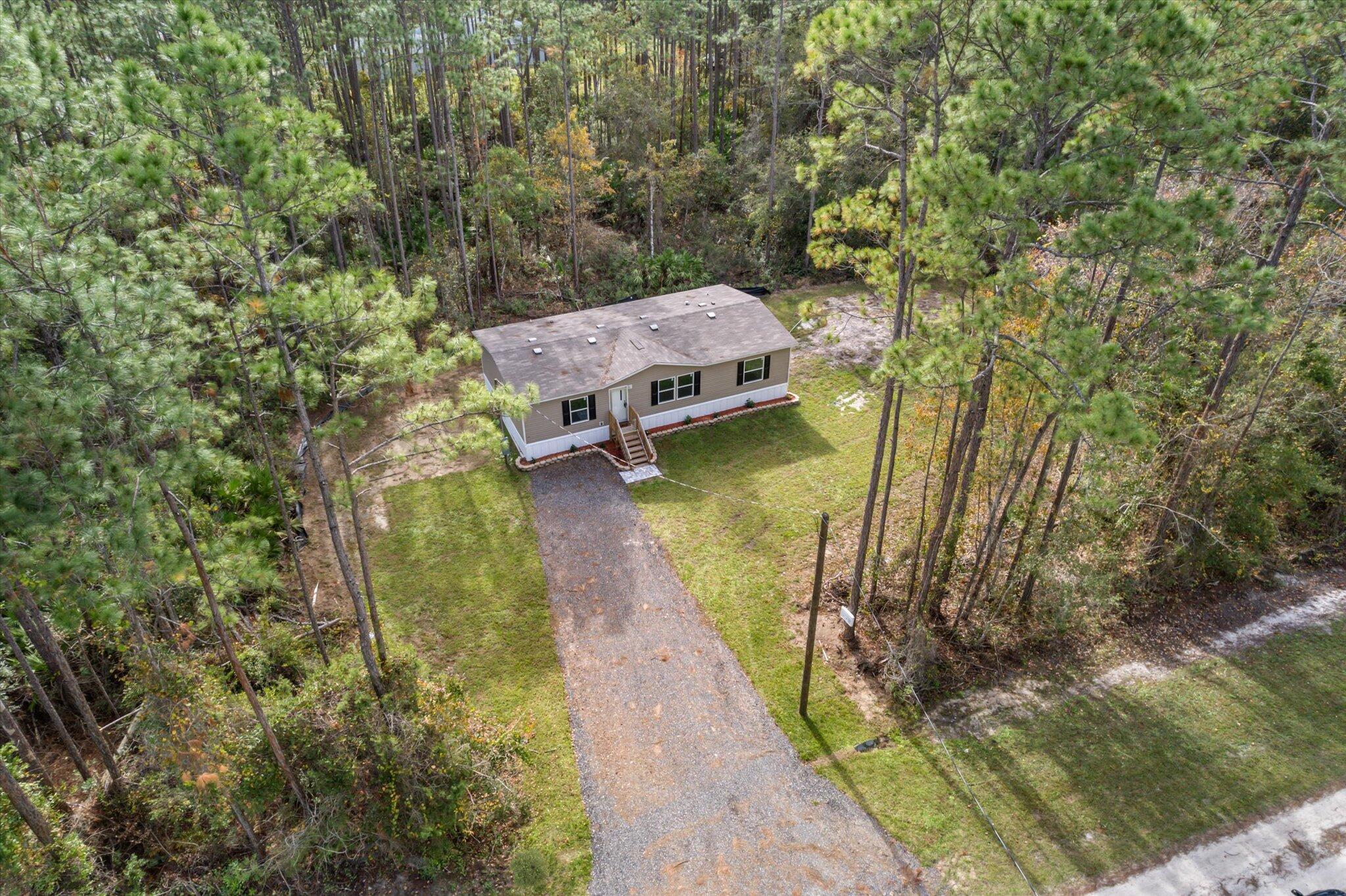 Seller incentives!! Brand New Home on over an acre of land! Bring all your toys! This home has 3 bed/2 bath, open floor plan, owners suite with a walk-in closet, and is ready for you to make it your own! Plenty of room outside for added storage, pool or whatever your heart desires. A short 15 minute drive to town, 30 minutes to the beach and close to all the near by lakes for fishing.