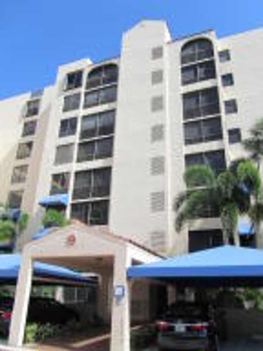 Opportunity to purchase a Brittany model condo on 6th floor! 2 bedrooms 2½ baths and 3rd bedroom is a den in this unit with beautiful built-in desks and furniture.  Stunning kitchen --- redone with a full size washer and dryer (approx.4 yrs.) behind doors and a spacious pantry.  Very light, and bright with large neutral porcelain tiles on floor.  Huge walk-in closet with custom shelving.  All exterior windows have been solar tinted.  TWO patios:  come enjoy the view of the first hole on the golf course!  Air conditioner unit -- 2 years plus or minus.  Only 2 units per floor in building.  A real bonus is your parking space is right next to the front door!!!!!!! (no walking in the rain). Boca Pointe country club has incredible optional al-a-carte membership plans available without having to purchase equity.  Boca Pointe is a club where you can define your life in a non-mandatory country club.  Define your membership:  social, golf, tennis.  Define your time:  3 months to 1 year.  Best deal in Boca for country club living.  Enjoy this active tennis, golf, and exercise lifestyle including clubhouse, exquisite dining room, valet parking, state-of-the art fitness center, aerobic & spinning classes, private trainers, heated pool & Jacuzzi & so much more!  Great central Boca location for malls, restaurants, and beaches.