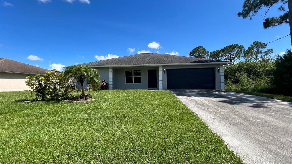 Photo of 1850 SW Effland Avenue, Port St Lucie, FL 34953 (MLS # R10902981)