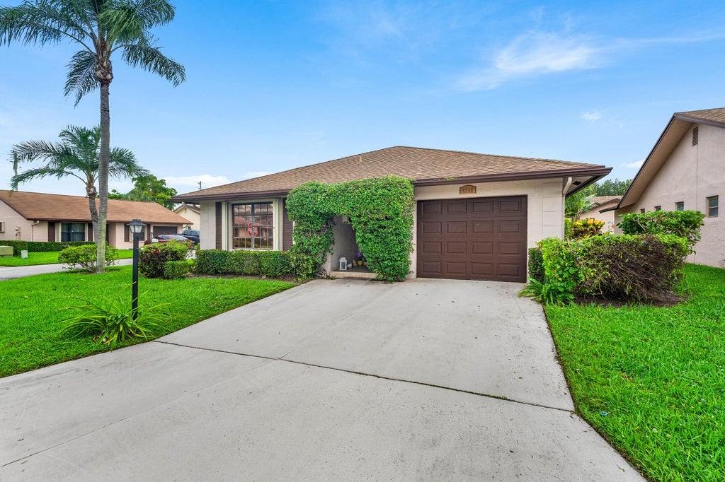 Photo of 6265 American Azalea Lane, Greenacres, FL 33463 (MLS # B26060429)