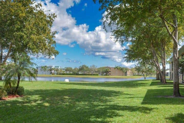 Photo of 15217 Lakes Of Delray Boulevard #94, Delray Beach, FL 33484 (MLS # R10781340)