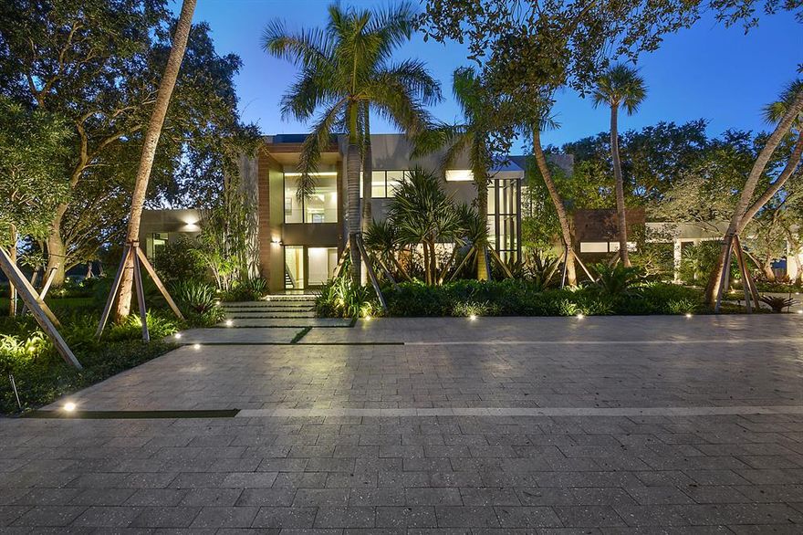 This ultra-modern, private gated estate located on 7.5 acres in Boca Raton is a must see! Designed by international award winning design firm PEPE CALDERIN, this spectacular property features a main house with fresh, modernistic interiors and buildout, overlooking a lake with separate guest house. The foyer opens to a two story gallery, leading to the full entertainment living room, family room, a defined dining room, media room and glass elevator. A kitchen with center island services a dinette and covered patio.  The second story Master suite and three additional bedrooms suites and open balcony complete the main house.  A covered walkway leads to separate first and second floor guest suites, and a three car garage.  A dramatic open pool with an infinity edge spa has a ...SEE MORE ...free standing cabana bath, covered patio with a stainless steel barbecue entertainment area.   

Additional Property Details and Amenities:

FOYER:
Two Story Wood Panel
Two Story Bronze Mirror Panel
Waterfall Feature
Glass Railing Staircase

DINING ROOM:
Stacking Stone & Wood Panel feature wall

KITCHEN:
Exotic bookmatch marble used on kitchen island
Custom Italkraft Crafted Italian Kitchen
Fully integrated & panel ready appliances for a modern and sleek look
Subzero 30" Fully Integrated Refrigerator
Subzero 30" Fully integrated Freezer
Subzero 30" Fully Integrated Tall Wine Storage
Miele 30" Built in M Touch Pureline Oven
Miele 24" Built in Coffee System Plumbed with Trim Kit
Miele 24" Built in Speed Oven/Microwave with Trim Kit
Miele 36" 5 Burner Gas Cooktop - Natural Gas
Miele 24" Fully Integrated ADA Dishwasher

LIVING ROOM:
Bar
Custom TV wall unit using wood, bookmatch marble, and black glass

FAMILY ROOM:
Walnut Wood Paneling
Bookmatch Copacabana Marble Slabs
5' Flame Ecosmart Fireplace

ELEVATOR:
Glass wall elevator

LAUNDRY ROOM:
Custom Italkraft Crafted Italian Cabinets

AV & CAMERA:
Control 4 Smart Home Lighting
Control 4 In Wall Touch Panel with Video Gate Intercom
Distributed Audio System
Pre-Wired for Distributed Video System
High Definition IP CCTV Cameras
Centralized Audio Visual Closet

POOL & CABANA AREA:
Built in BBQ area with top of the line Viking appliances
Large covered area for seating and entertaining
Outdoor & Indoor shower
Pool and Spa are heated with gas
Pool is 60ft x 20ft
Spa is 15 ft x 10 ft

4 Car Garage

MASTER BEDROOM:
Custom built-in desk area
Custom Wood Panel Walls & Doors

MASTER BATHROOM:
His & Her Toilet Room
His & Her Showerheads
Linear Drain
Bathtub
Access to His & Her Closet
Custom Wood Panel Walls & Doors

MASTER CLOSET:
Custom Italkraft Italian Crafted Closets

HALLWAY:
Laundry Chute on Second Floor

BATHROOMS:
Linear Drains in all Showers

OFFICE / GUEST HOUSE:
Flexible space above the Garage with Closet, Kitchenette, & Bathroom

ROOF: Thermoplastic Polyolefin, a thin, rubberlike, single-ply sheet membrane material used for roofing commercial and industrial structures. The raw TPO resin is mixed with materials to resist weathering and fire, thin sheets are bonded to the top and bottom of a polyester fiber core to make roofing material that can withstand the elements.

Room for tennis court, sport court and game areas 

HOME ORIGINALLY CONSTRUCTED IN 1990. MAJOR RENOVATION COMPLETED IN 2019.