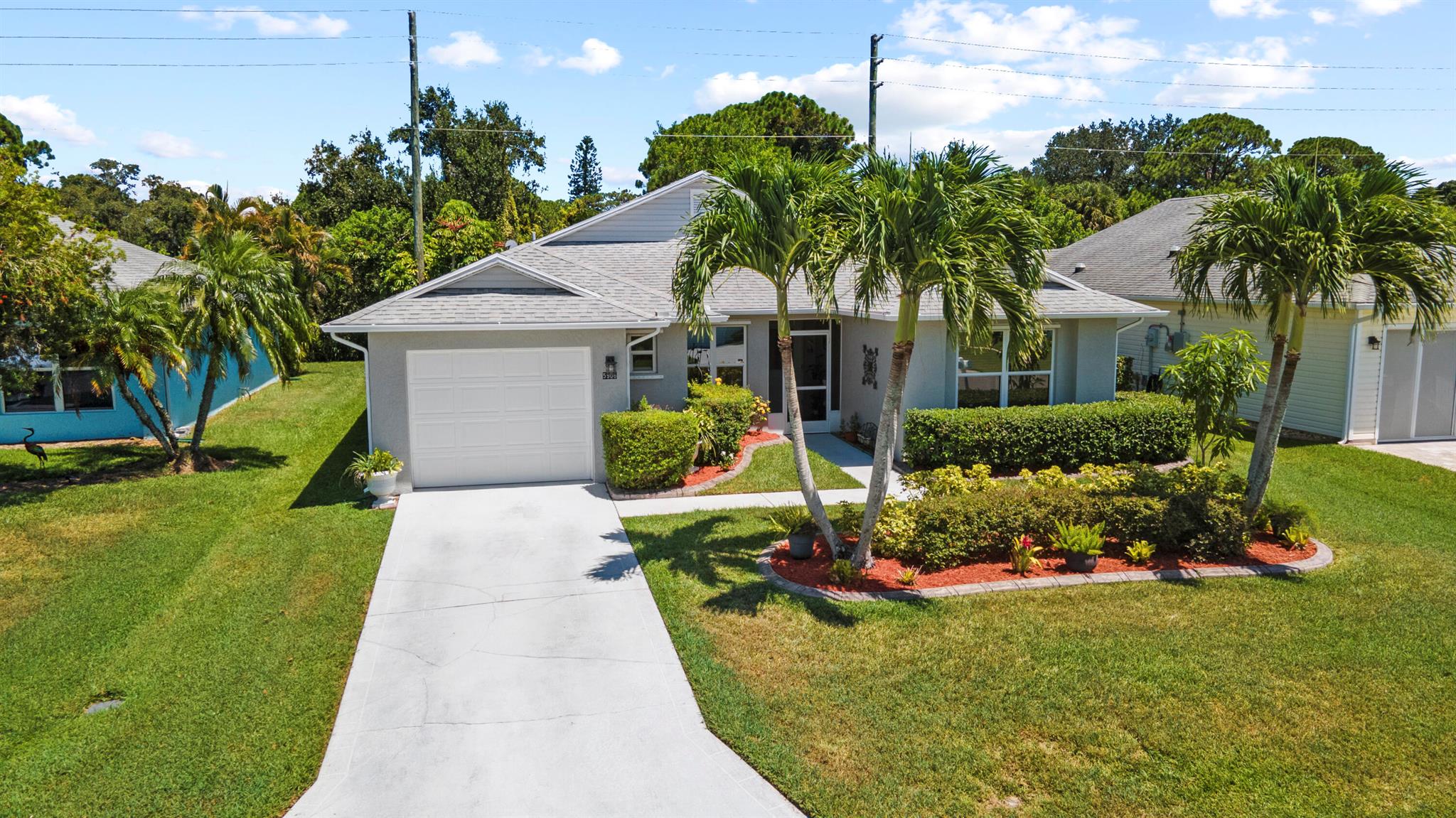 Welcome to this charming 2-bedroom, 2-bathroom home in a highly desirable 55+ gated community of Palm Grove in Fort Pierce. This residence offers a comfortable layout with spacious living areas, a bright kitchen (granite counters, stainless steel appliances), and a cozy screened patio perfect for relaxing. The community provides security and a peaceful lifestyle, along with amenities tailored for active adults, pool, tennis courts, shuffleboard, clubhouse. Conveniently located near shopping, dining, golf courses, and Fort Pierce's beautiful beaches, this home combines comfort, convenience, and community living. Perfect for year-round living or a Florida retreat!