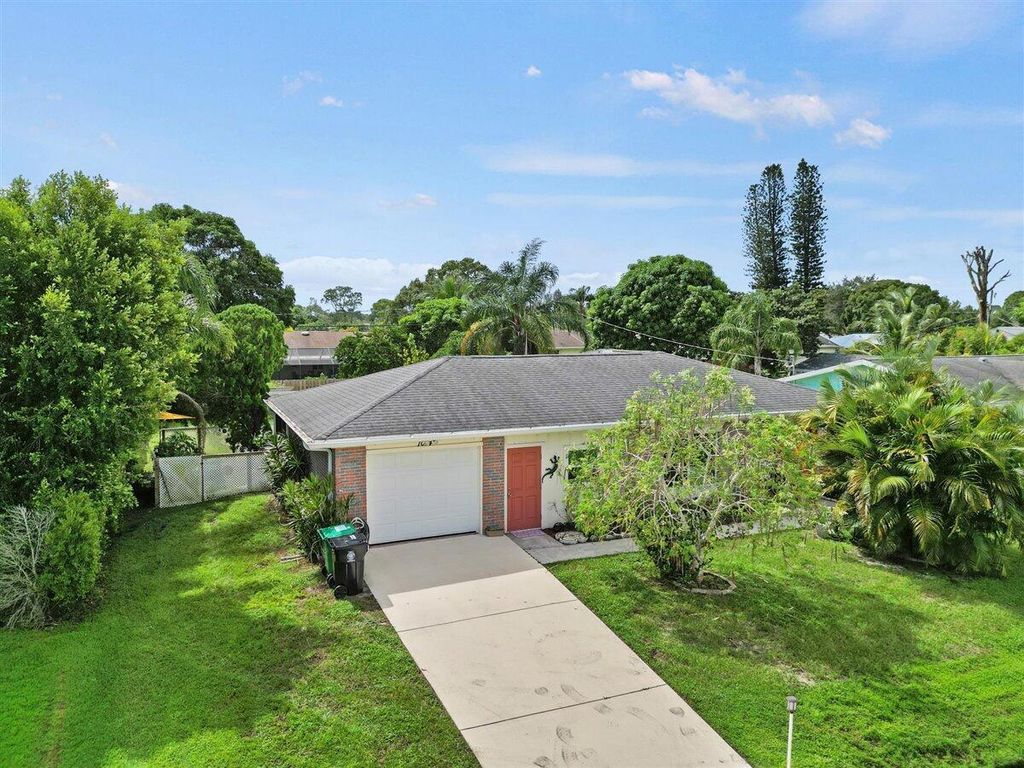 Photo of 1014 SE Euclid Lane, Port Saint Lucie, FL 34983 (MLS # R10924656)