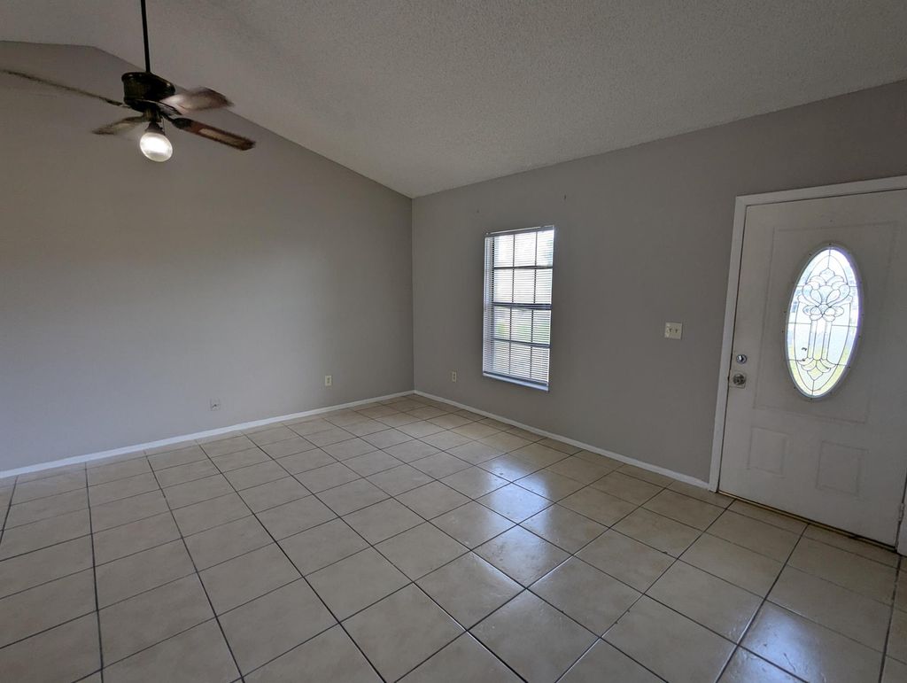Photo of 554 SW Lakehurst Drive, Port Saint Lucie, FL 34983 (MLS # R11084495)