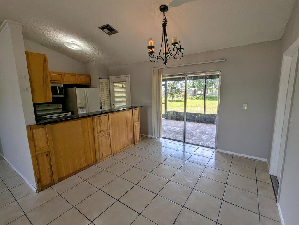 Photo of 554 SW Lakehurst Drive, Port Saint Lucie, FL 34983 (MLS # R11084495)