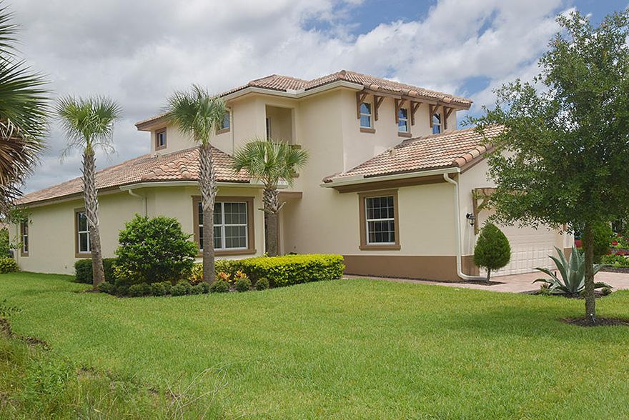 Discover this immaculate custom built ''Cordoba'' model home. Beautiful 2 story concrete construction with impact glass & over 3400 total sqft! Premium lakefront + preserve on 2 sides for ultimate privacy. Light & bright open floor plan with spectacular Chef's Kitchen. Stainless steel appliances +induction cooking, 42'' wood cabinets, huge granite island bar + butler's pantry. Dramatic 10' ceilings, crown molding, engineered wood floors, custom window treatments & light fixtures. 1st floor Master Retreat with his/hers walk-in closets, dual travertine marble vanities, huge shower, ''Royal'' soaking tub + slate flooring. Den/Office + 2nd bathroom on 1st floor. LG Steam washer/dryer, cat 6a Ethernet, LED lights, Icynene attic insulation + dual ACs. Smart,Energy efficient home