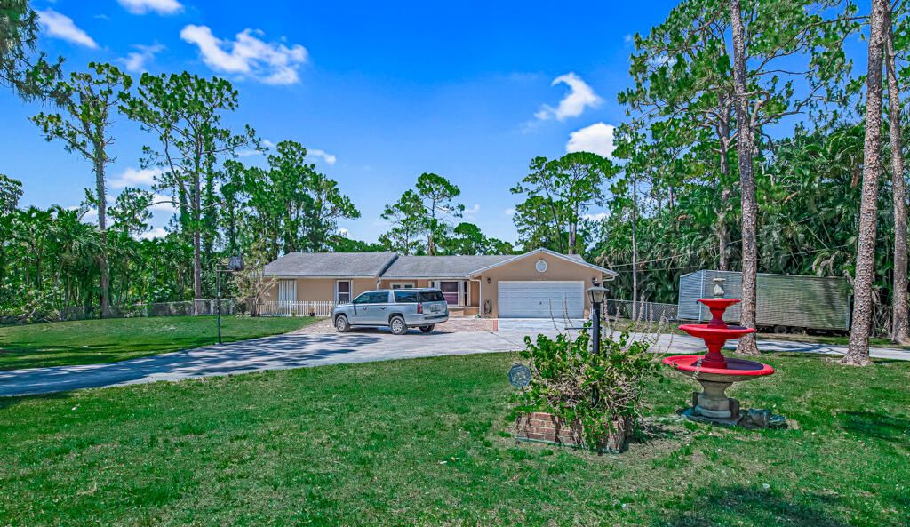 Photo of 11849 59th Street N, The Acreage, FL 33411 (MLS # R11010657)