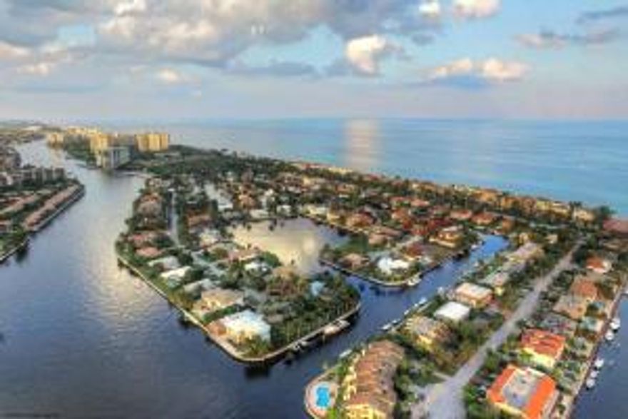 This Highland Beach waterfront estate is tucked off A1A on the exclusive island of Bel Lido Isle. Conveniently located between Delray Beach and Boca Raton, enjoy the nearby shopping, restaurants and nightlife. Boasting 115 feet of direct deep waterfrontage with an 80+ foot dock, this two story residence has it all. Meticulously maintained, many of the amenities are in pristine, brand new condition. Upon entering the residence the immediate focal point is the abundant natural light and stunning tropical views of the pool, lush landscape and water. The home features a spacious first floor master wing with two large closets, custom double sink vanity, spa soaking tub and separate steam shower. The master suite also offers amazing water views and opens