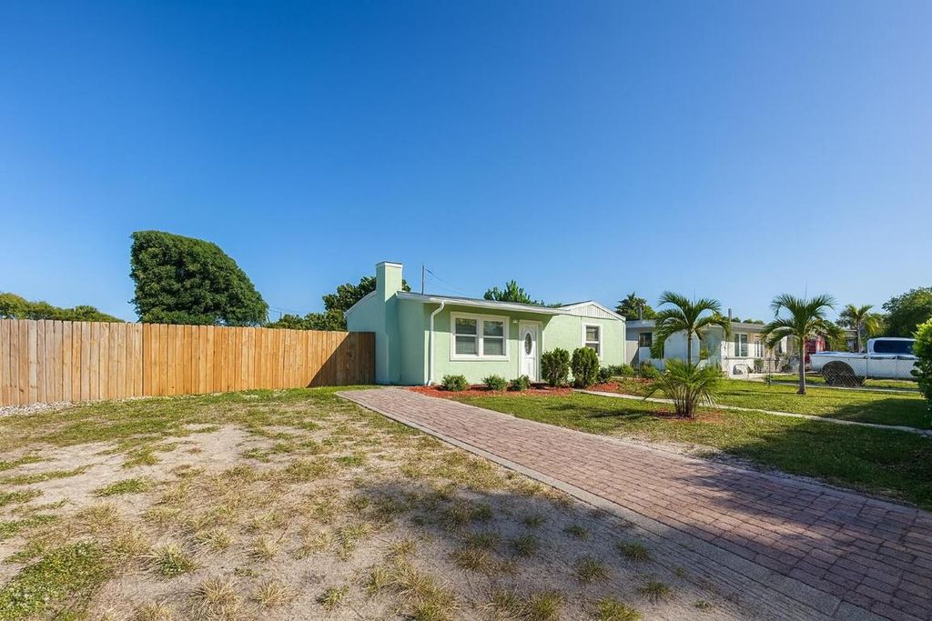 Photo of 1027 Beech Road, West Palm Beach, FL 33409 (MLS # R11142039)